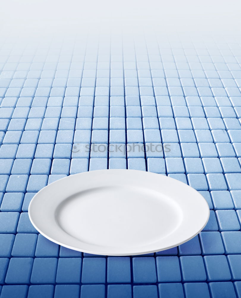 Similar – Empty plate on blue wood background