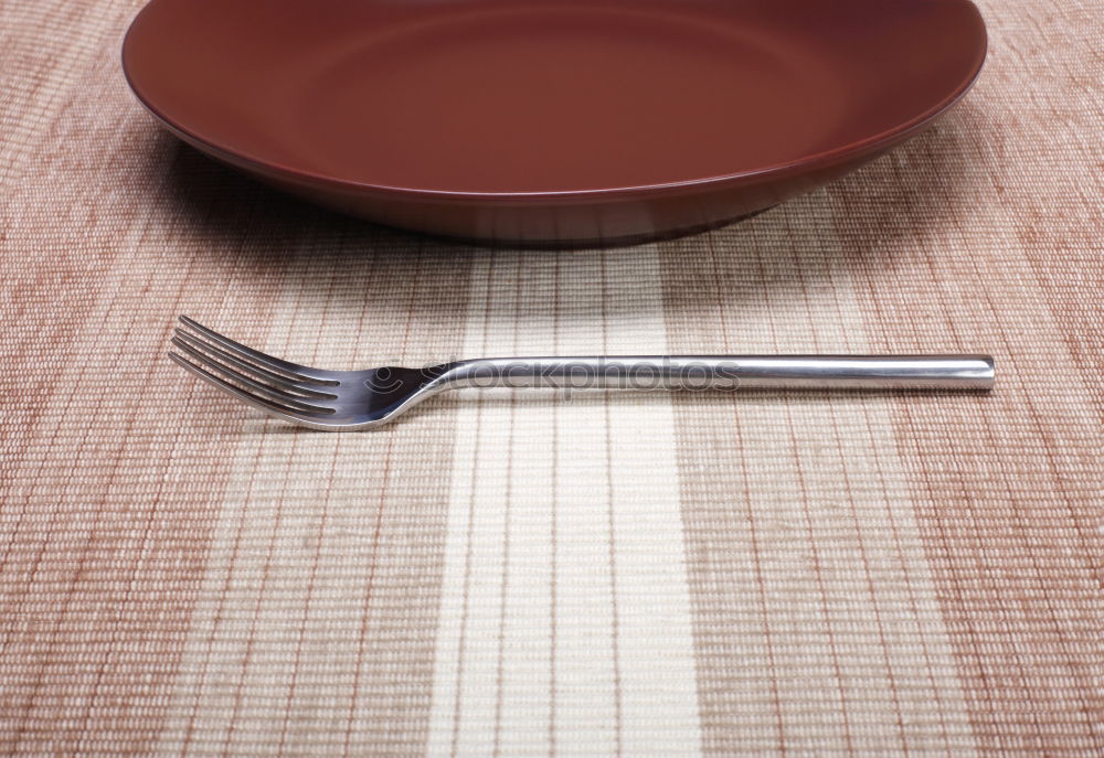 Similar – Half empty white plates, vintage knife and fork