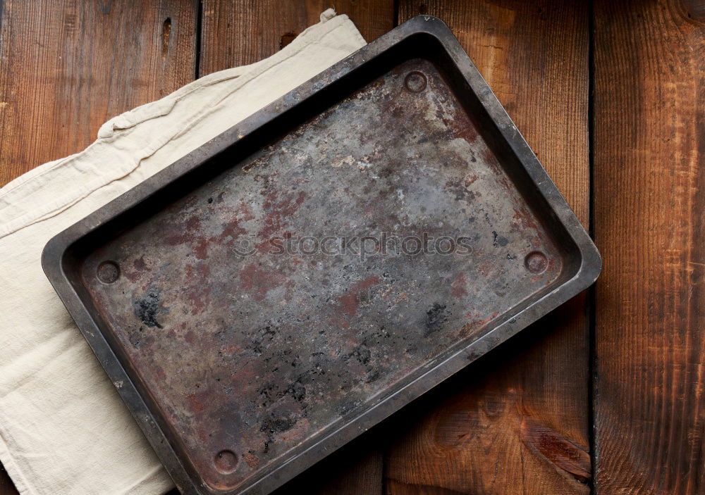 Similar – old wooden kitchen chopping boards and a red towel