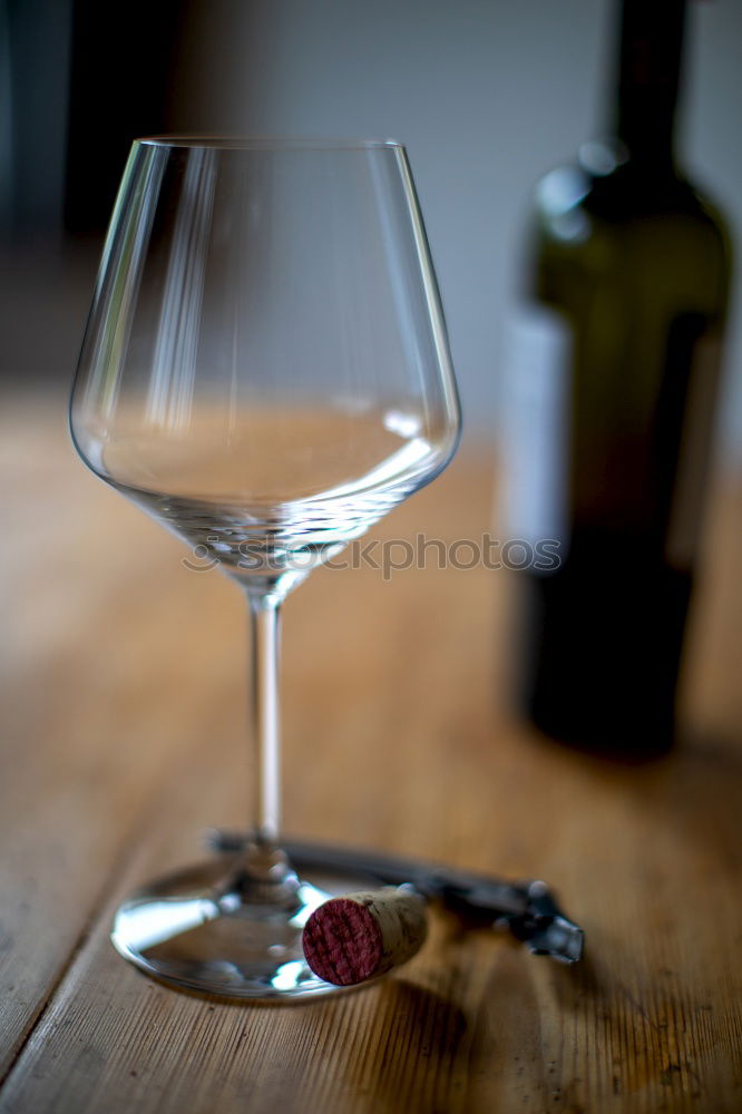 Similar – Glass of wine on wooden table