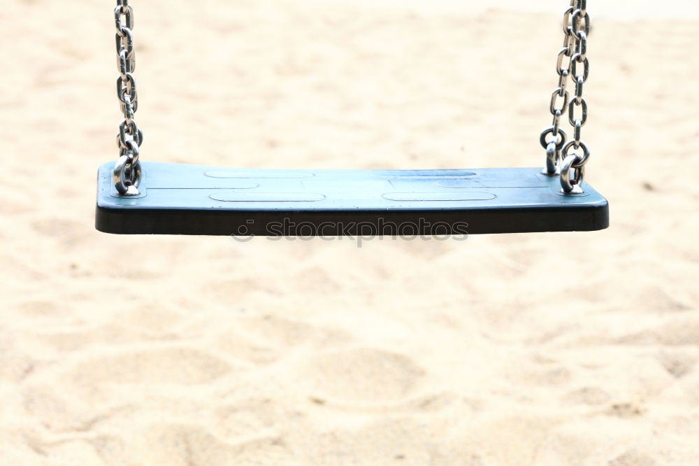 Image, Stock Photo Empty children’s swing on a playground with shade