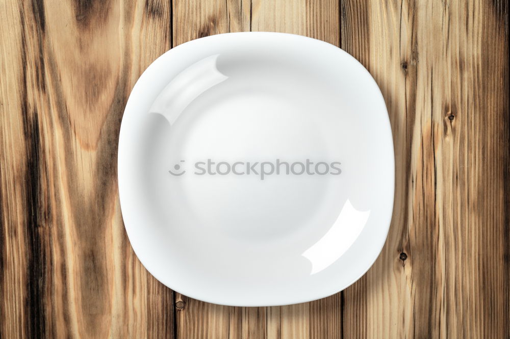 Similar – Image, Stock Photo Empty bowl on black wood in bird’s eye view