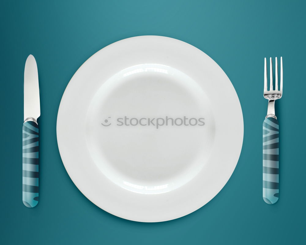 Similar – Empty plate on blue wood background