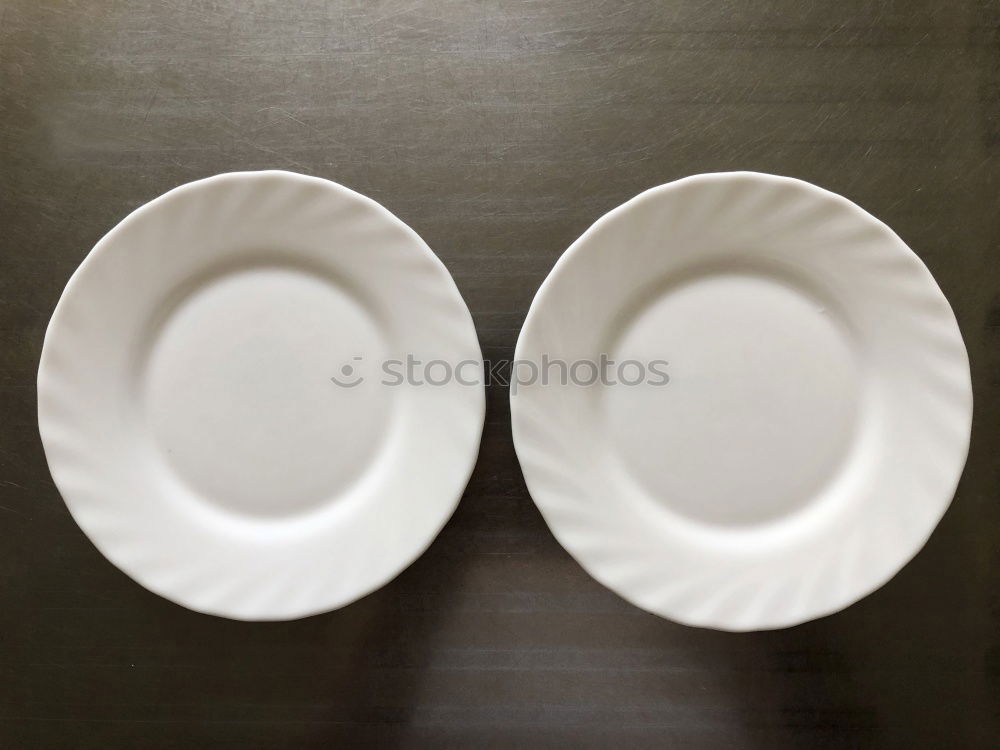 Similar – Image, Stock Photo Empty bowl on black wood in bird’s eye view