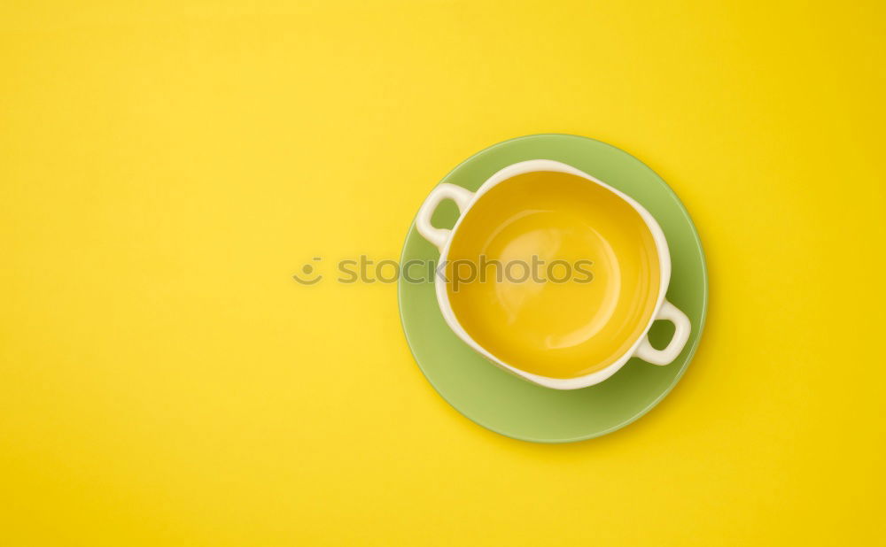 Similar – Top view of black coffee and coffee beans on yellow