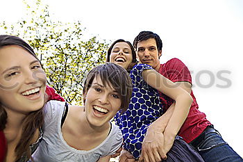 Similar – Image, Stock Photo Group of friends taking selfie in urban background.