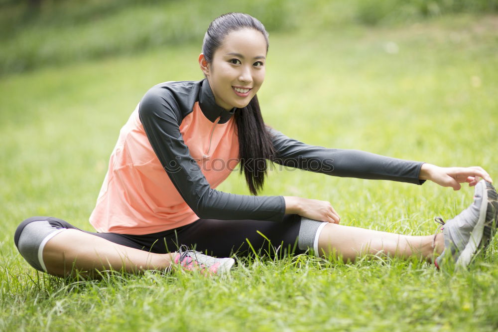 Similar – Athletic young woman doing push up exercises