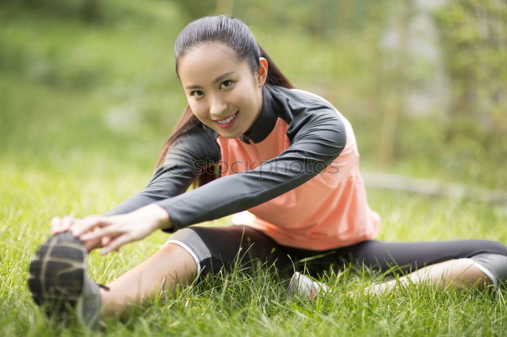 Similar – Happy fit young woman doing stretching exercises