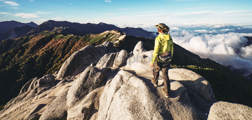 Similar – Rock climbing team bivouaced in a storm.