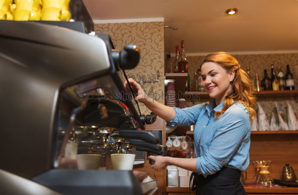 Similar – smiling Barista girl prepares coffee