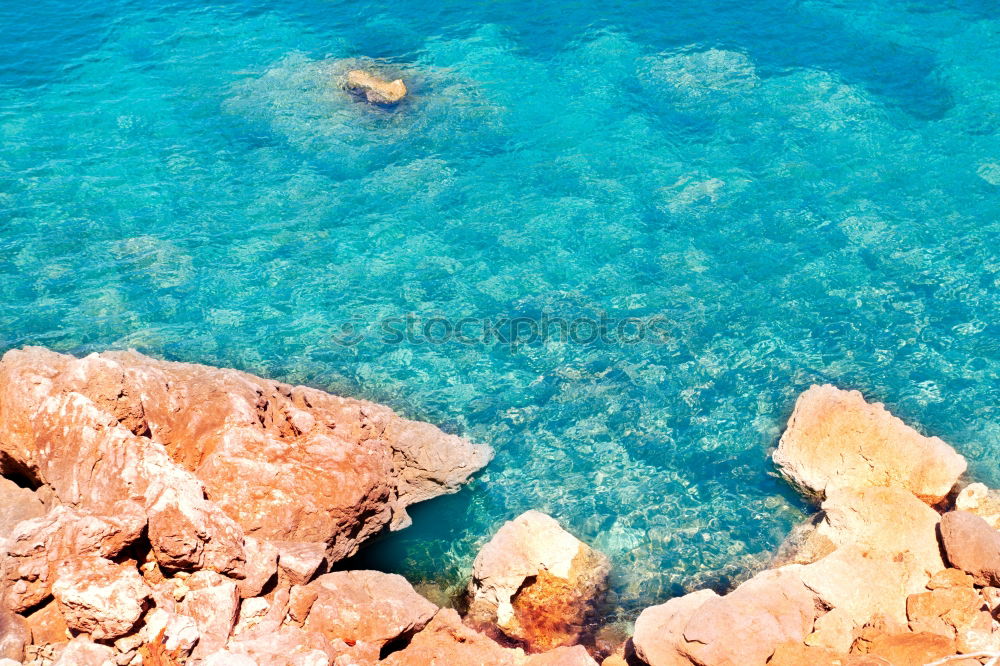 Similar – Boat anchors in rocky bay with turquoise blue sea from above