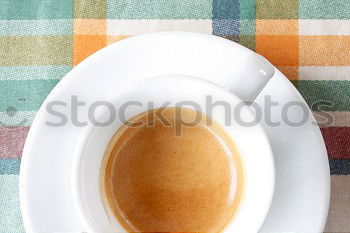 Two woman hands holding empty latte cappuccino coffee cup