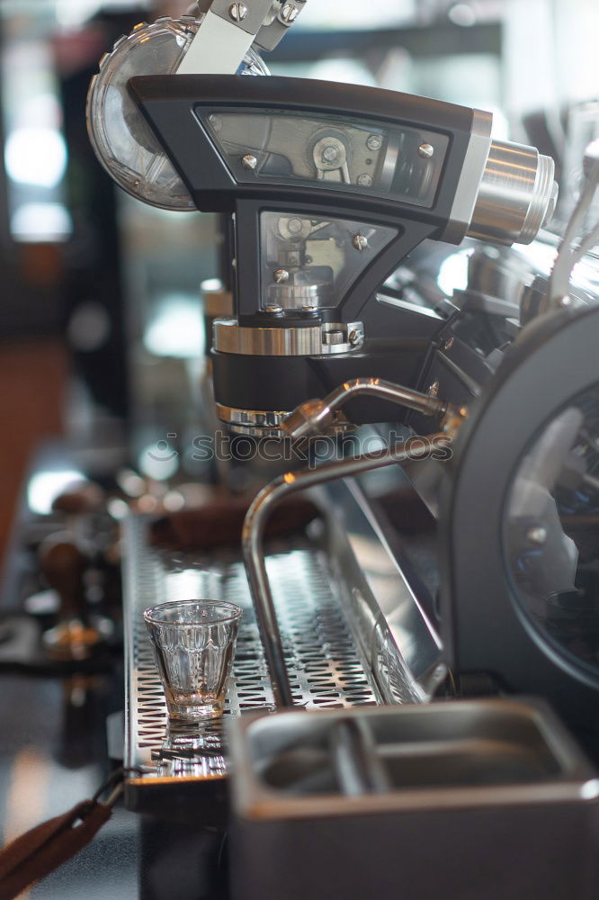 Similar – Preparation of a coffee with a barista coffee machine