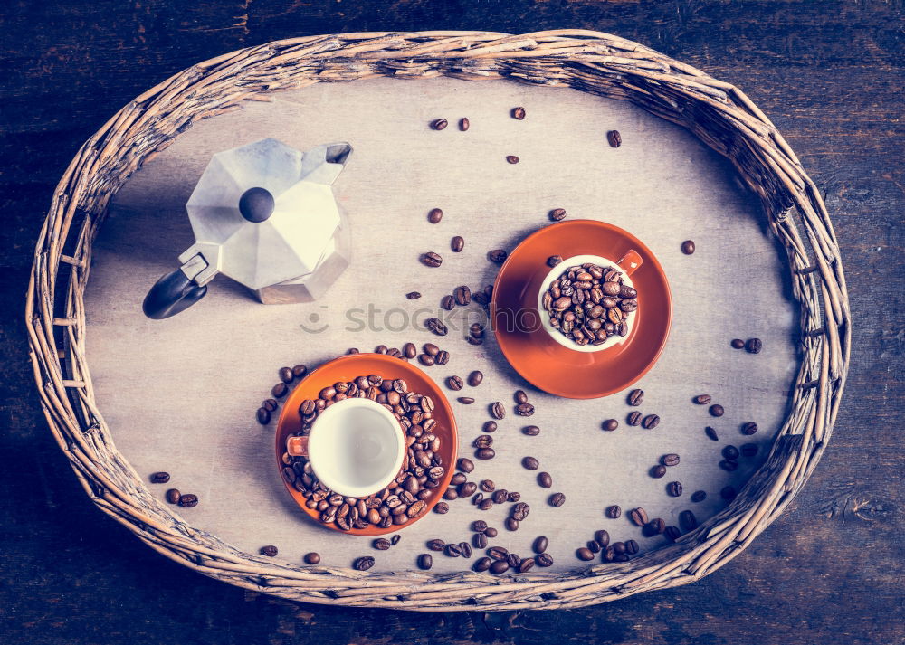 Espresso set with coffee cups, beans and coffee pot