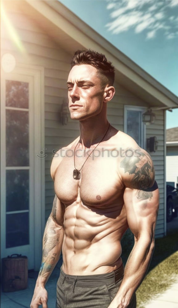 shirtless muscular man showing abs