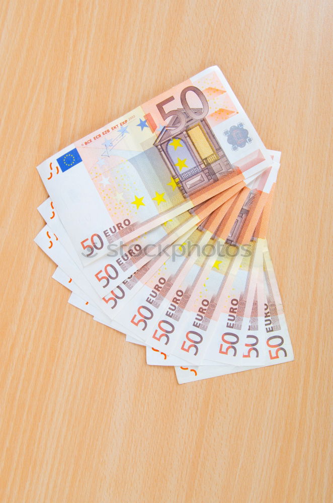 Similar – Image, Stock Photo 500 euros cash money stack of the Bank for Finance banknotes