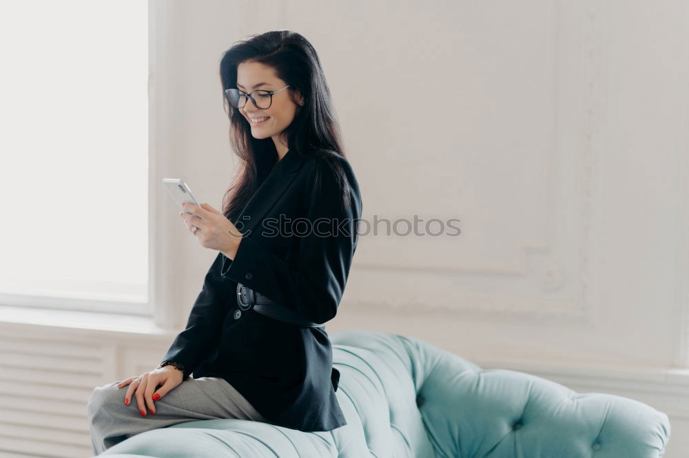 Similar – Image, Stock Photo Young woman resting on armchair