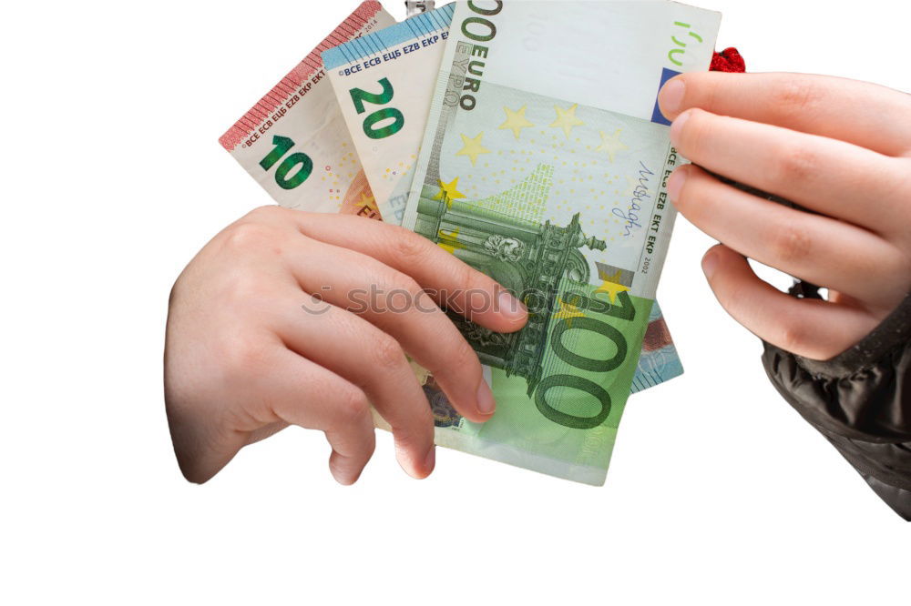Similar – Image, Stock Photo Payday | hands of a young woman and many banknotes standing on the table before her.
