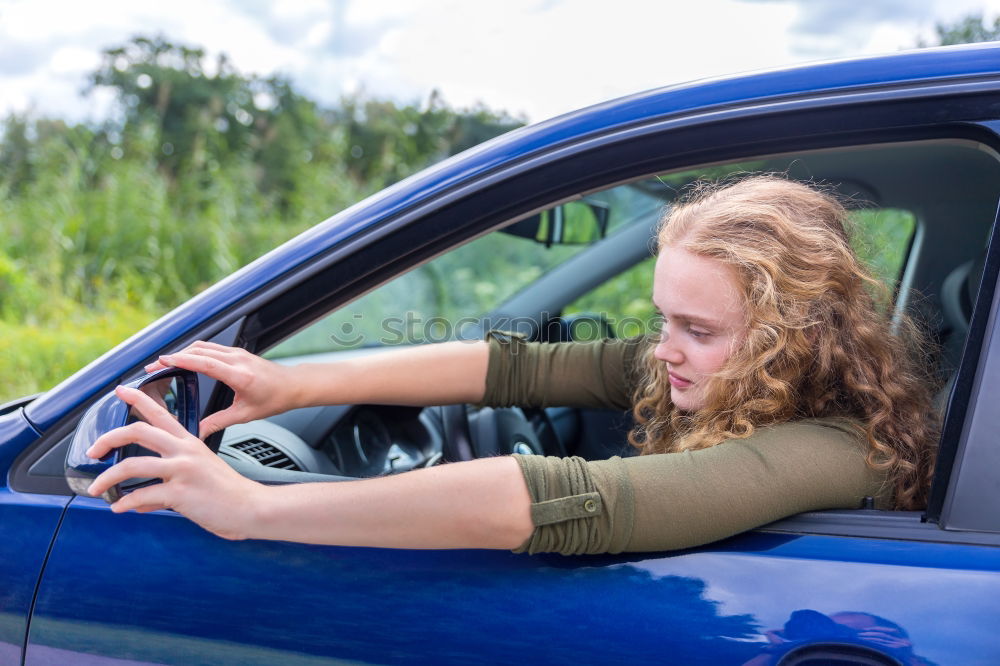 Similar – Image, Stock Photo funny child girl playing driver, sitting on front seat in car