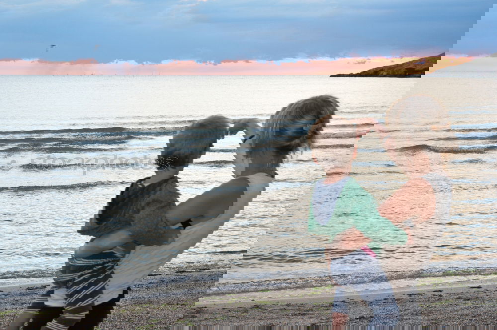 Similar – Image, Stock Photo Father and son playing on the beach at the day time. Concept of friendly family.