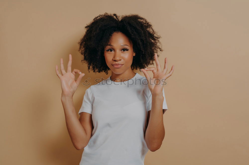 Similar – Ethnic woman at white wall