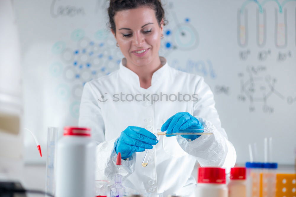 Similar – Image, Stock Photo Woman looking at test tube