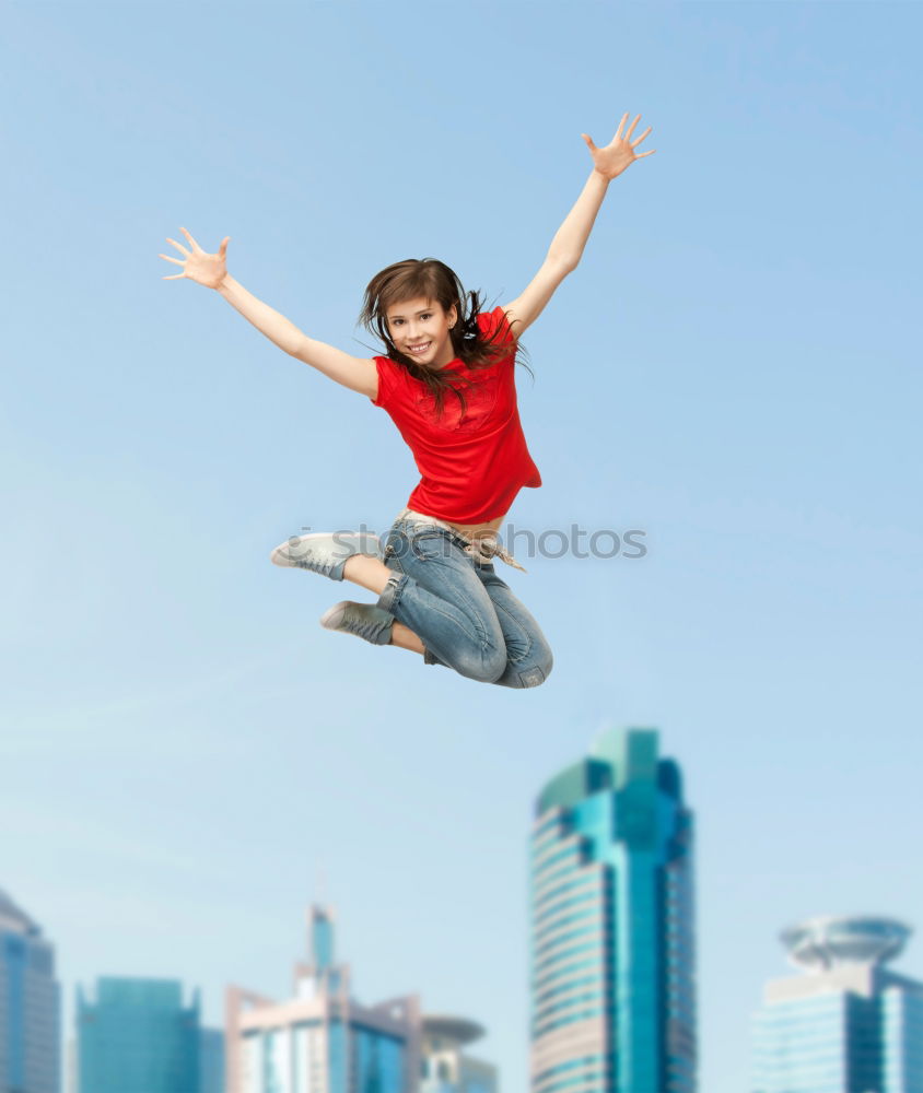 Similar – Image, Stock Photo Young multirracial couple jumping happy at sunset on the rooftop