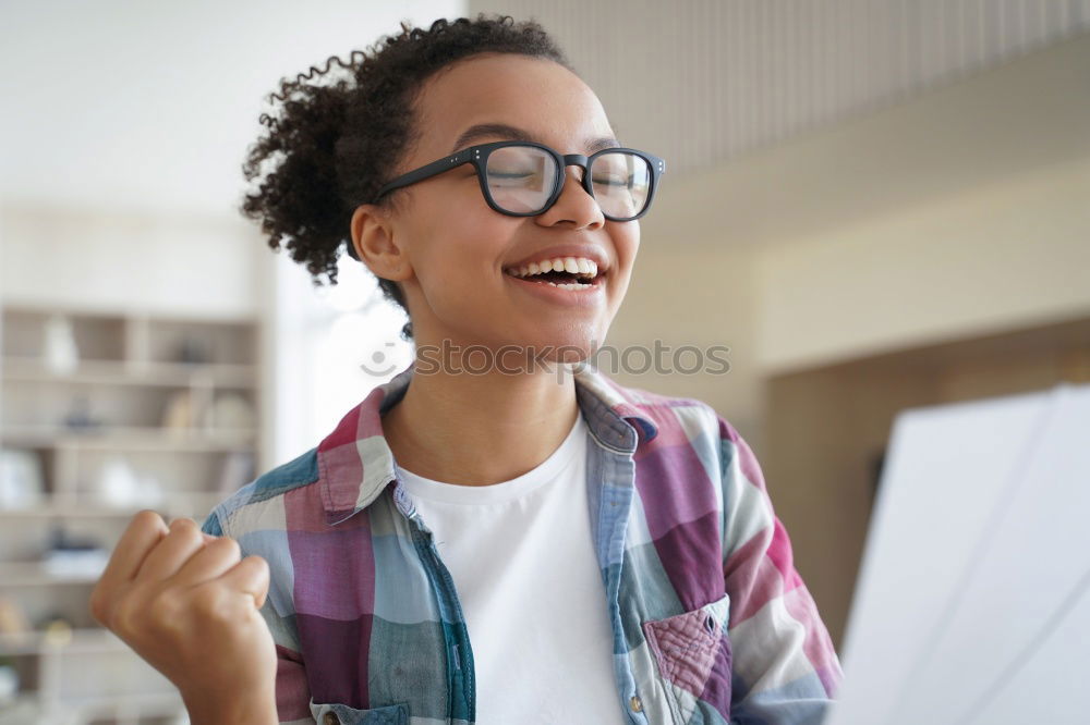 Similar – Image, Stock Photo Portrait of a young thoughtful mixed race man sitting in the sofa