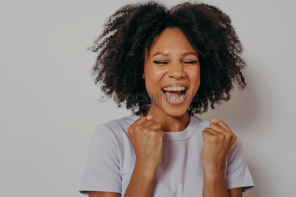 Similar – Ethnic woman making faces