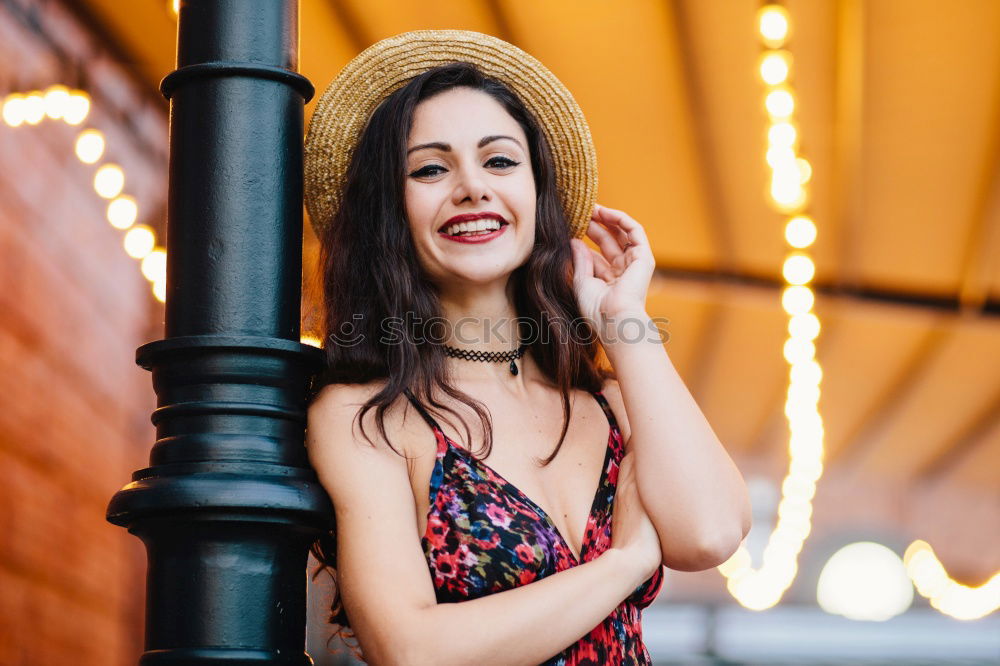Similar – Image, Stock Photo Young woman smiling and sitting in an urban bar