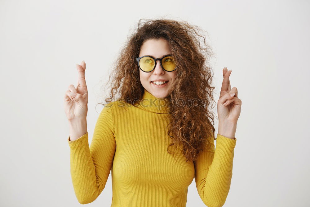 Image, Stock Photo Young redhead smiling woman in yellow hipster beanie cap pulls FFP2 mask away from face below