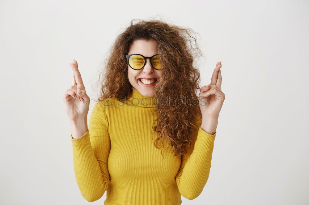 Similar – Image, Stock Photo Young redhead smiling woman in yellow hipster beanie cap pulls FFP2 mask away from face below