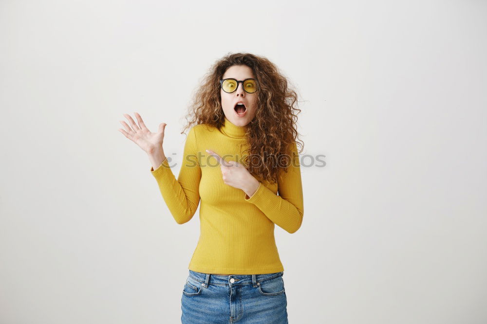 Similar – Cheerful woman in yellow jacket