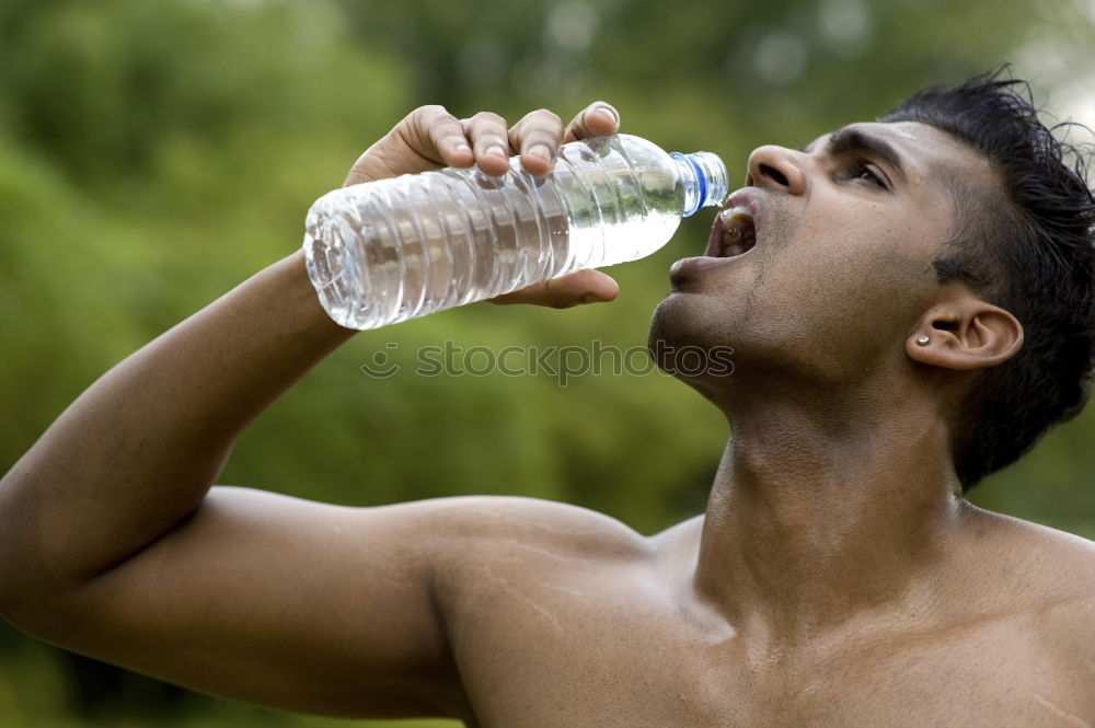Similar – Image, Stock Photo Fit shirtless young black man drinking water after running