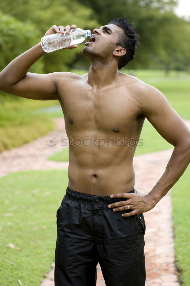 Similar – Image, Stock Photo Fit shirtless young black man drinking water after running