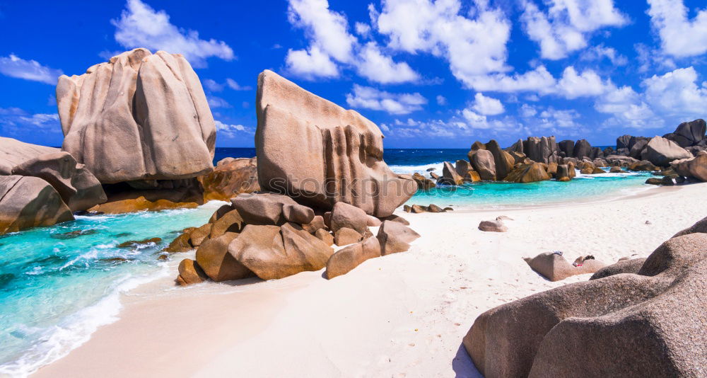 Similar – A view of a isolated beach and blue waters