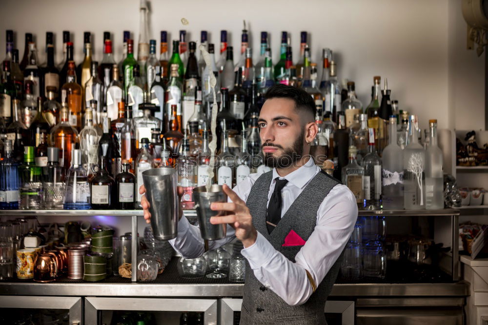 Similar – Barman is making cocktail at night club.