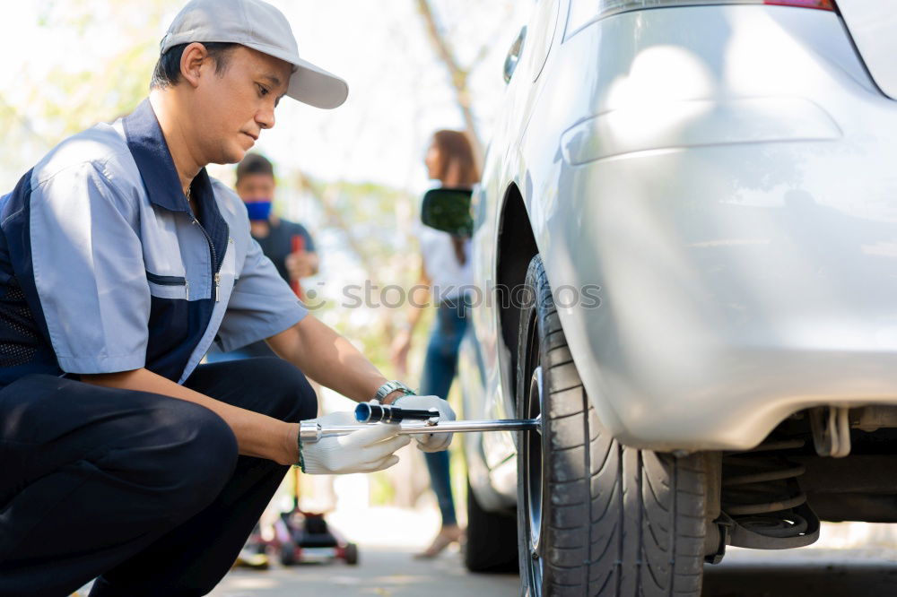Similar – Image, Stock Photo Professional Mechanic Repairing Car Engine.