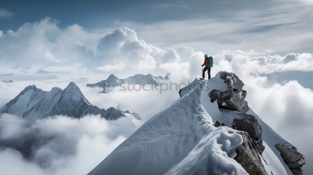 Similar – Rock climbing team reaching the summit.