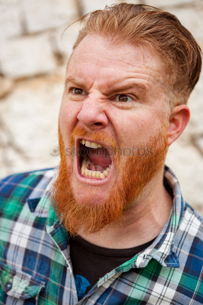 Similar – Portrait of a hipster guy putting silly face