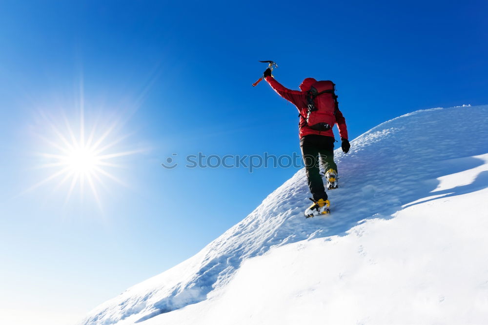 Image, Stock Photo Mountaineer at the top of a snowy mountain