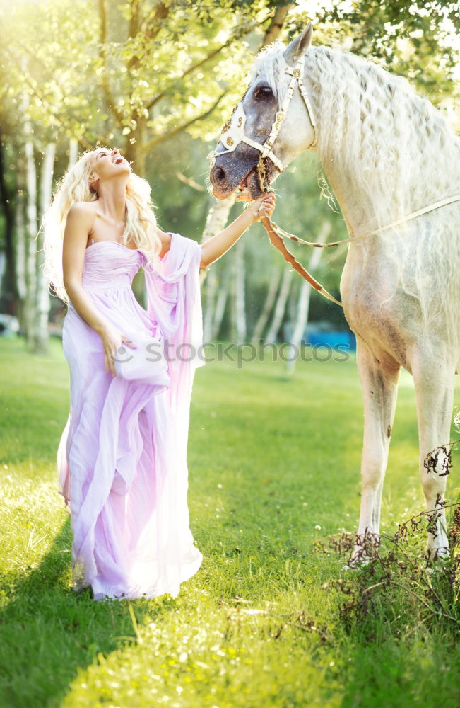 Similar – Image, Stock Photo Communication between young man and horse