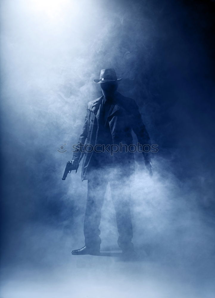 Similar – Woman wearing trench coat and standing in fog