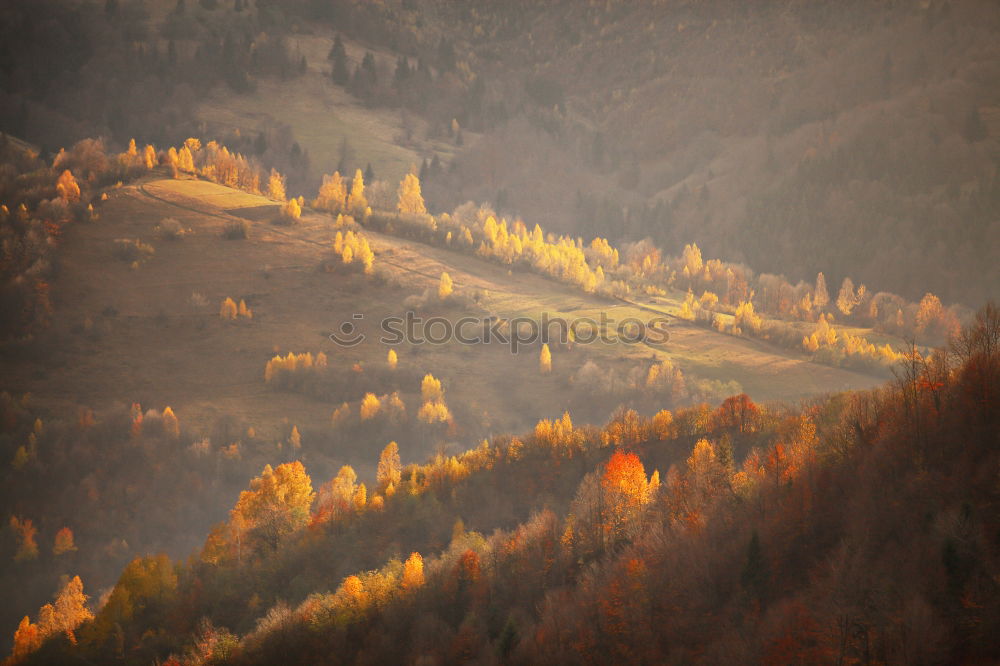 Similar – Fall in mountain village. Alpine October scene.