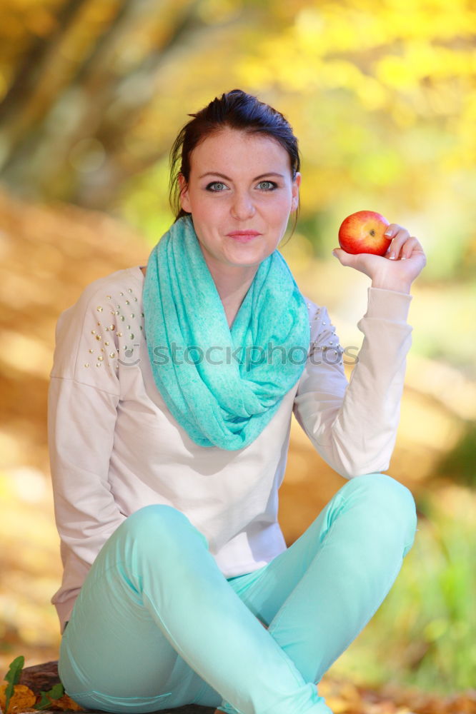 Similar – Image, Stock Photo Young woman bites an apple