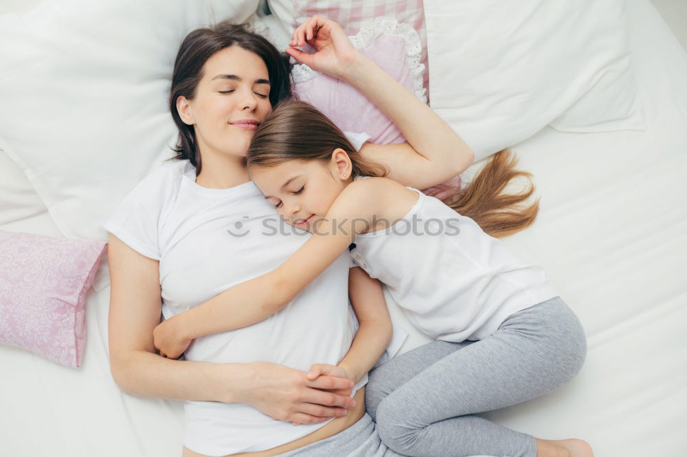 Similar – Image, Stock Photo mother and child son sleeping together