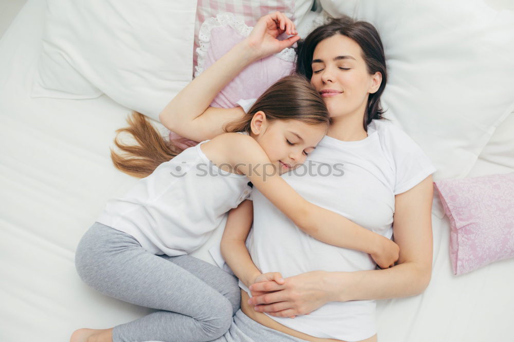 Similar – happy mother hugs her toddler son in the morning