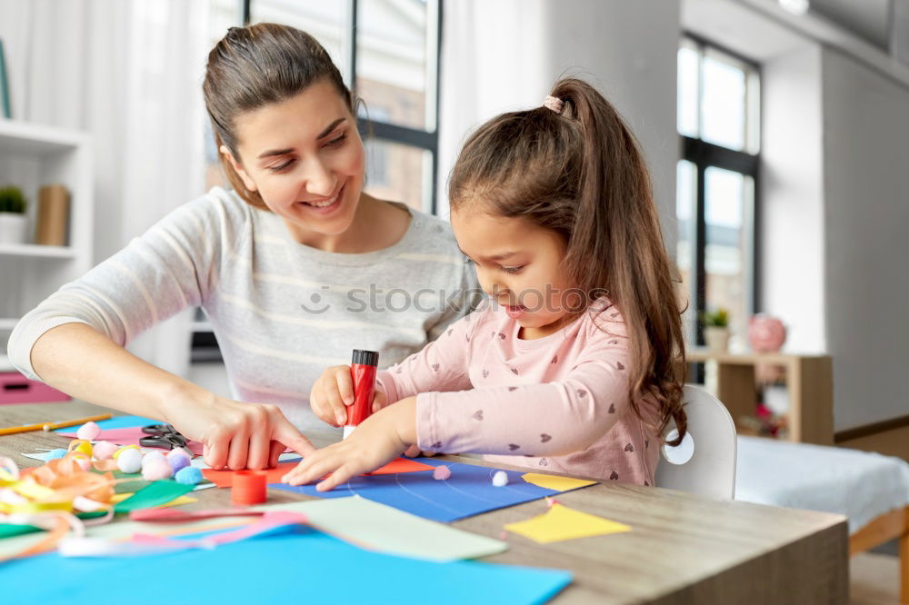 Similar – Image, Stock Photo Woman assembling furniture at home with Daughter