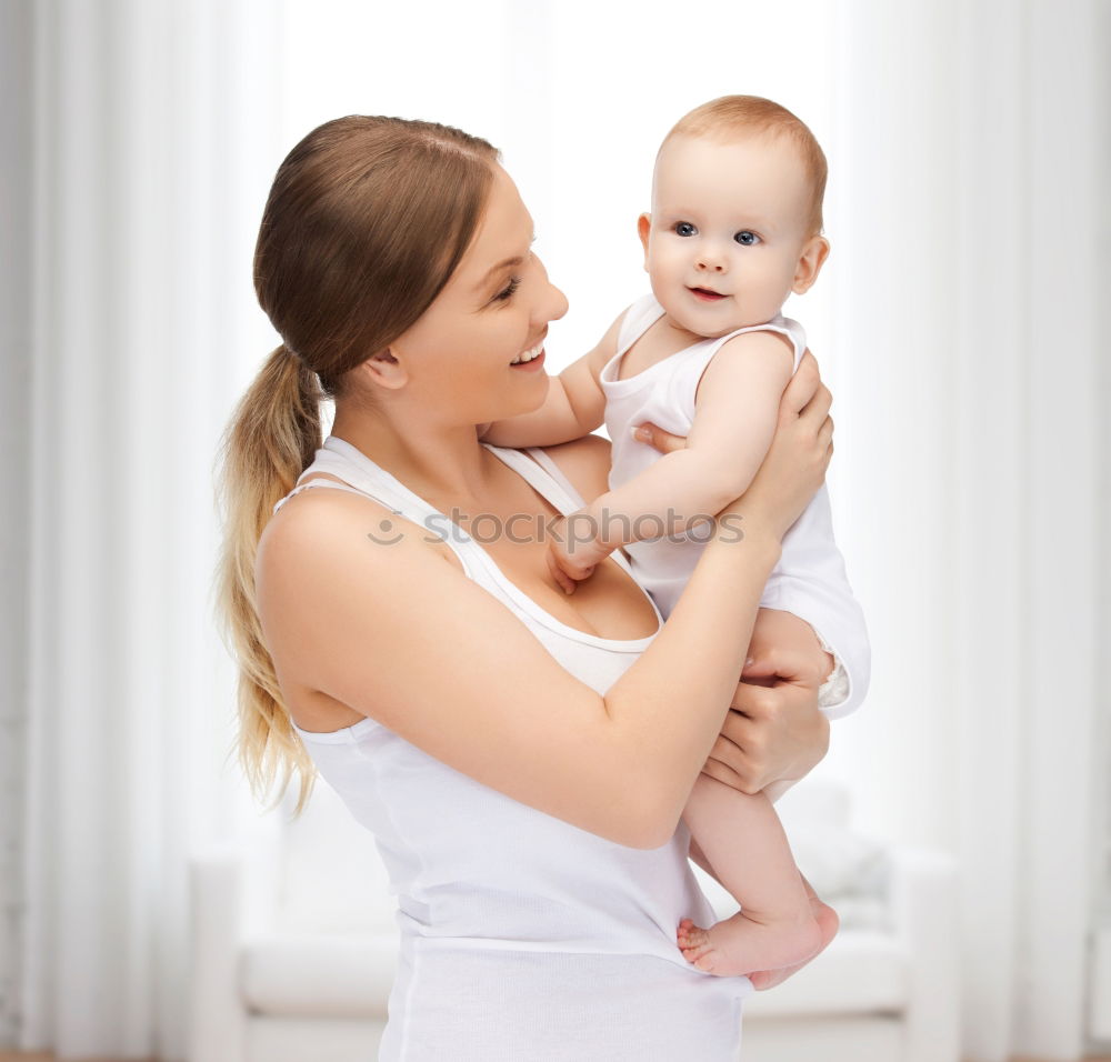 Similar – Image, Stock Photo Portrait of a mother with her baby at home.