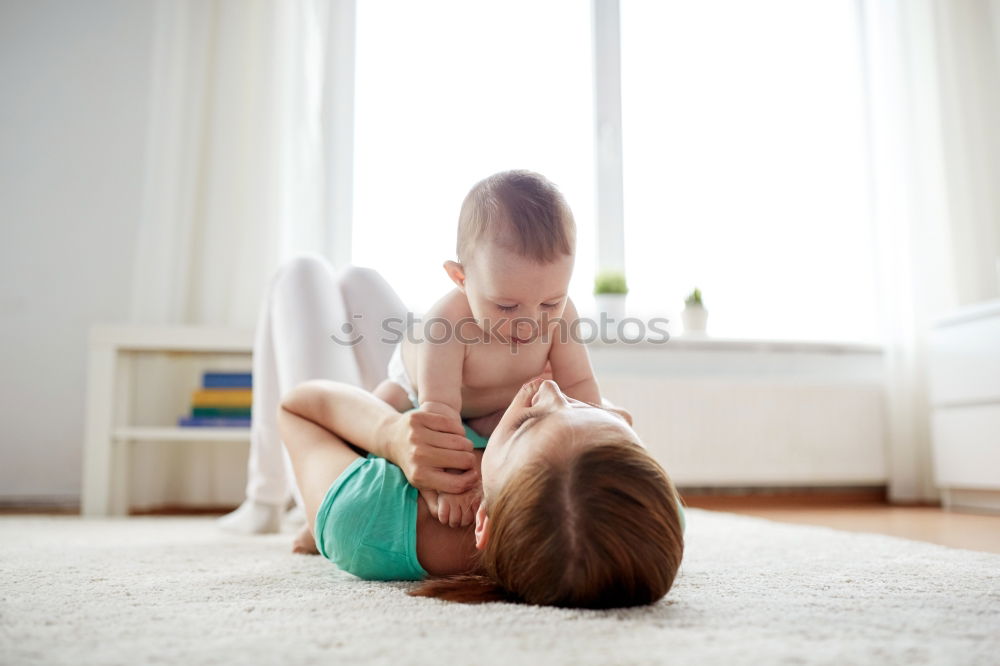 Similar – Two beautiful sisters playing on bed